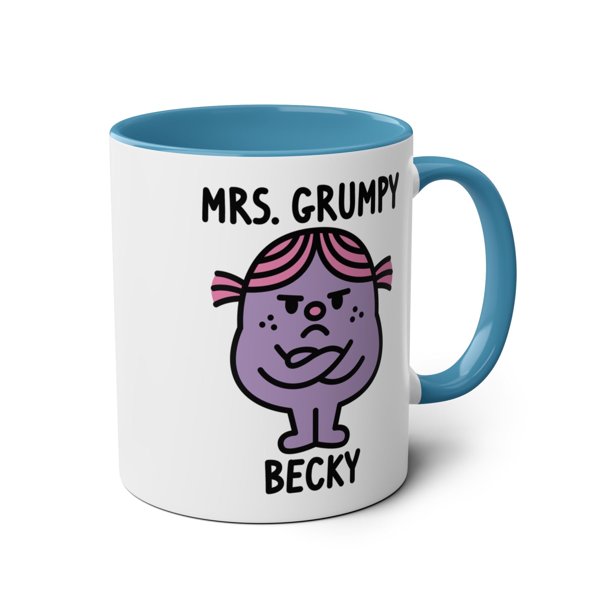 Mug with cartoon character 'Mrs. Grumpy' on a white background with blue accent colour