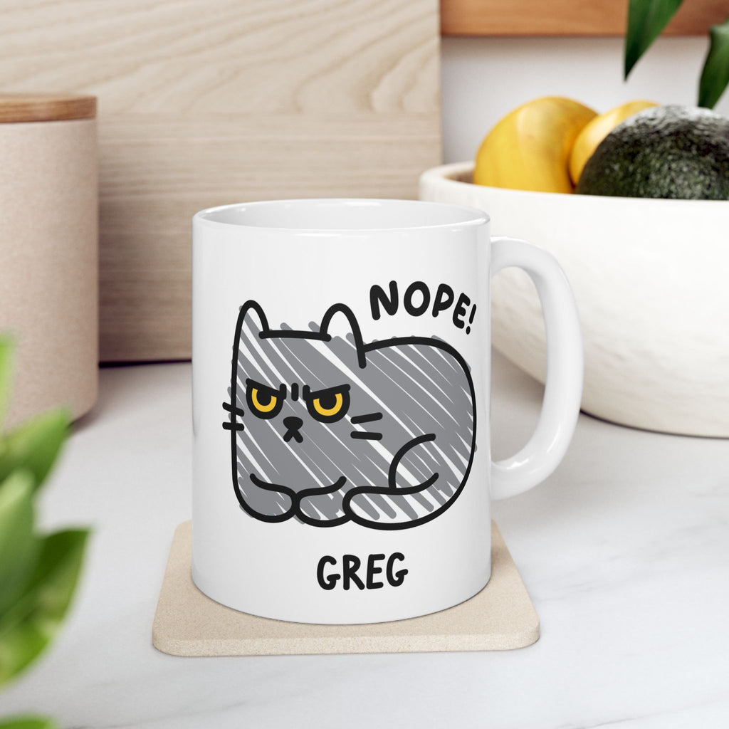 Grumpy Doodle Cat Personalised Coffee Mug On Coaster in Kitchen Background